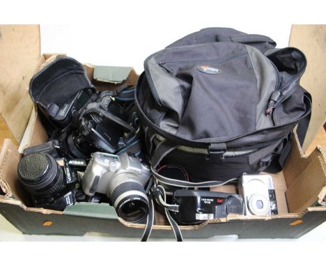 Nine cameras, to include a Minolta Dynax 5xi digital camera and a Minolta Dynax 40 digital camera