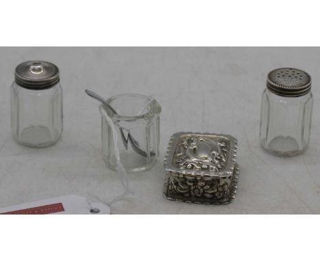 A late Victorian silver pocket snuff box, having repousse decoration, vacant cartouche and gilt-washed interior; together wit