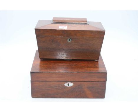 An early Victorian rosewood tea caddy of sarcophagus form on bun feet, width 28cm; together with a Victorian rosewood box, 29