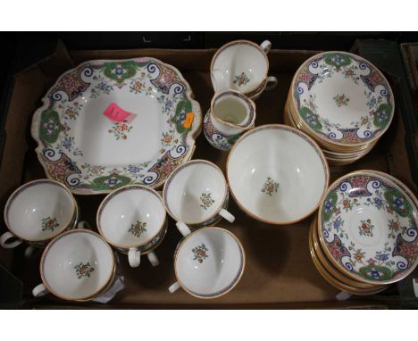 A Mintons floral decorated part tea service 