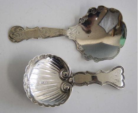 A Victorian silver caddy spoon, having a scallop shaped bowl and further shaped stem, monogrammed SB, maker Foxall &amp; Co, 