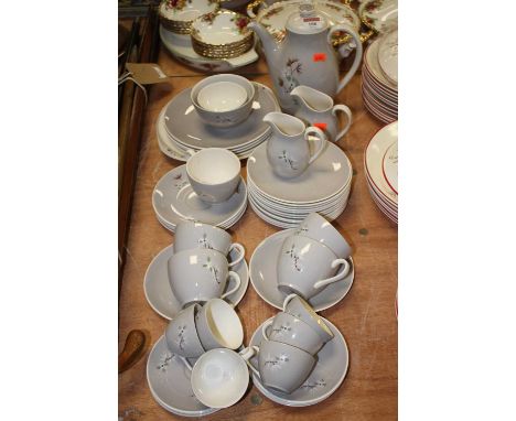 A Royal Doulton six-place setting tea and coffee service, in the Frost Pine pattern, D6450, having printed mark verso 