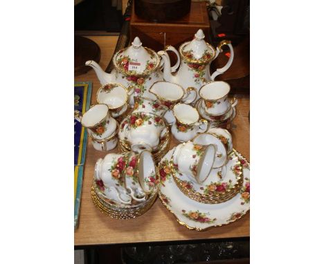 A Royal Albert six-place setting coffee and tea service, in the Old Country Roses pattern 