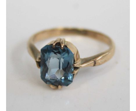 A 9ct gold blue topaz dress ring, the oval cut topaz measuring approx 9 x 6mm, 1.8g, size J