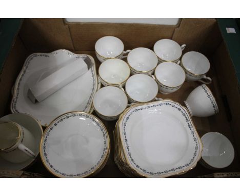 An early 20th century Heathcote enamel decorated bone china tea service