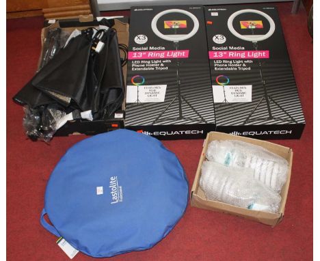 A collection of photography equipment, to include a pair of Equatech 13" ring lights and a collapsible sweep box