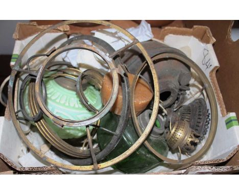 A collection of oil lamp spares