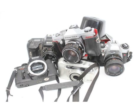 Five vintage cameras, to include a Chinon DP-5 SLR camera, a Praktica MTL 3 SLR camera, a Ricoh KR-10M SLR camera, a Ricoh KR