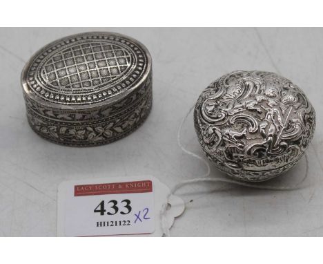 A Victorian silver pocket snuff / pill box, of circular tapered form, the hinged lid repousse decorated with a courting coupl