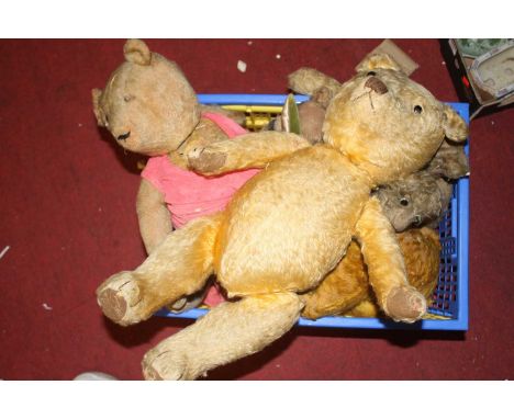 A collection of vintage teddy-bears, to include a blond mohair exampleEach bear in very poor condition overall.