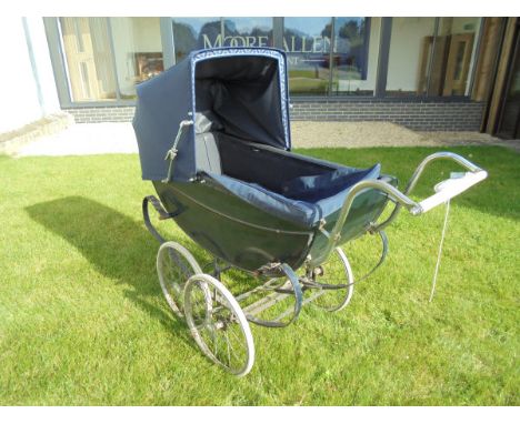 A vintage four wheel Silver Cross type pram