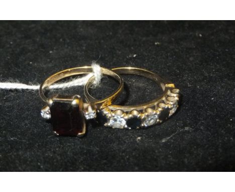 A diamond and sapphire 9 carat gold dress ring in the Victorian taste and a ruby and diamond set 9 carat gold dress ring