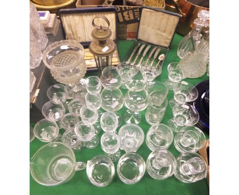 A collection of various glass ware to include six Talisker tumblers, various shot glasses, hock glasses, four facet cut lique