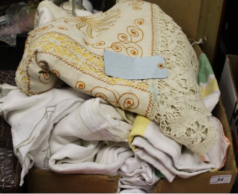 A box containing assorted vintage tablecloths to include crocheted, seersucker, etc, and a bag containing further assorted la