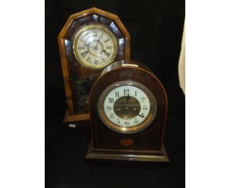 A circa 2900 mahogany and inlaid cased dome topped mantle clock, the eight day movement with circular dial and Arabic numeral