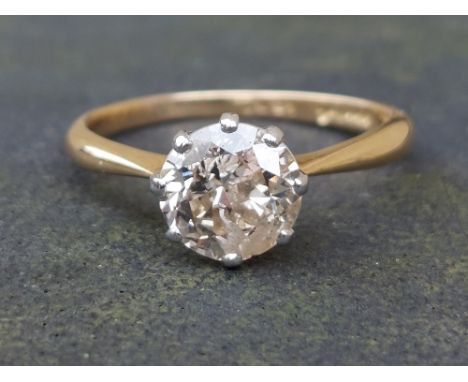 A diamond solitaire ring, the claw set brilliant weighing in excess of one carat, on '18ct' shank.  Finger size K/L.