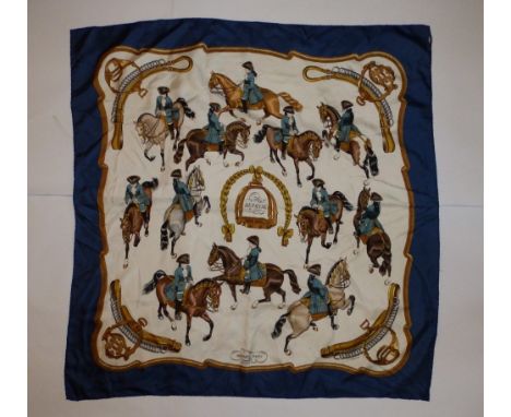 A silk Hermes headscarf - 'Reprise' with royal blue border, 35" x 34".