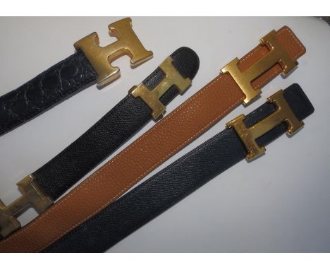 Two Hermes leather belts, 33.5" &amp; 37.5" overall and two others. (4)