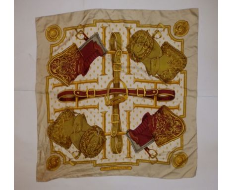 A silk Hermes headscarf - 'Selles a Housse', 34.5" x 33.5".