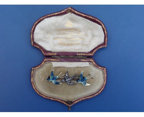 A boxed bar brooch set with three swallows decorated in enamels &amp; rose cut diamonds, 1.5" - some loss to enamel.