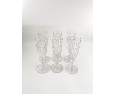 A set of six Baccarat crystal champagne flutes. H.18CM