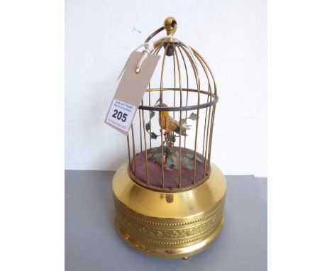 A modern West German singing bird automaton; gilt-metal base and with suspension ring (23cm high)