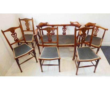 An early 20th century six-piece&nbsp;canapé&nbsp;and salon chair suite; two-seater sofa, single corner chair and four en suit