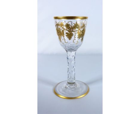 A circa 1780 wine glass with gilt decoration and facet stem (approx. 15cm high) Condition Report: The gilding appears bright 