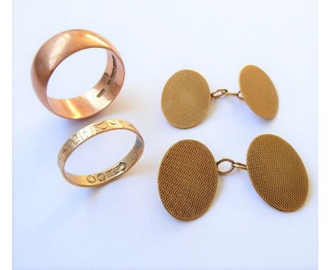 A pair of 9-carat yellow gold oval cufflinks, each plaque with engine-turned decoration, together with two 9-carat yellow gol