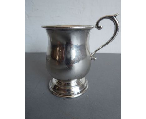 A hallmarked silver christening cup of baluster form and engraved '13-9-56', assayed Sheffield 1954 (8cm high not including h