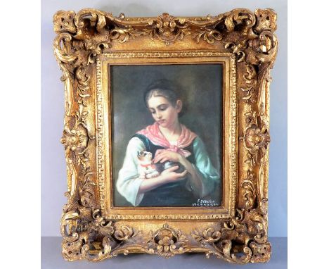 A 19th century style (later reproduction) ceramic plaque depicting a young girl with her cat, facsimile signature lower right