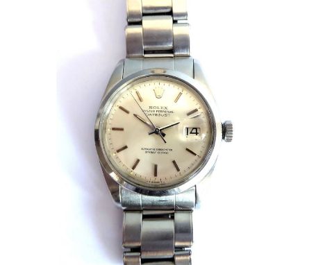 An early 1960s gentleman's steel-cased Rolex Oyster Perpetual Datejust wristwatch; the silver coloured dial signed'Superlativ