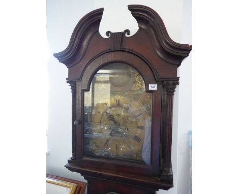 An 18th century oak-cased eight-day longcase clock; the broken swan-neck pediment above a 12-inch broken arch brass dial with