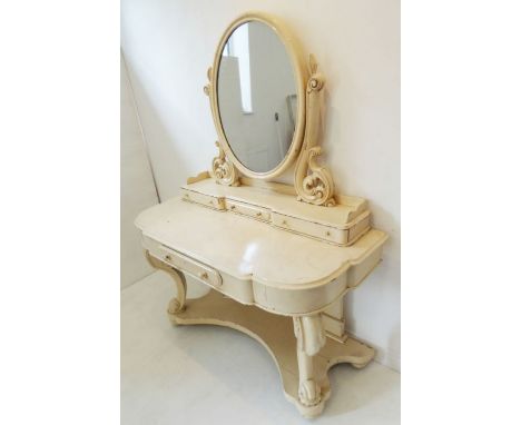 A mid-19th century duchess-style dressing table; later painted,&nbsp;oval mirror and galleried top above a single central dra