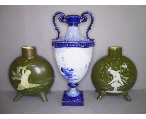 A matched pair of late 19th century Moore Bros. vases and a Royal Crown Derby vase by WEJ Dean. The matched pair with green g