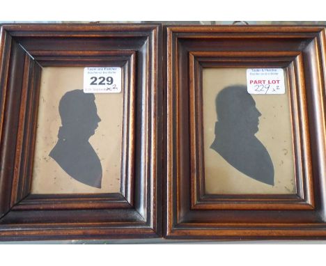 Two similar framed and glazed gentleman's portrait miniature silhouettes (the frames 17cm x 13.5cm)