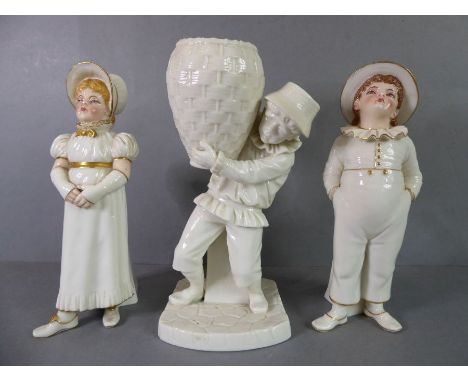 An unusual pair of circa 1883 Worcester porcelain (Kate Greenaway) noveltysugar sifters modelled by James Hadley as a corpule