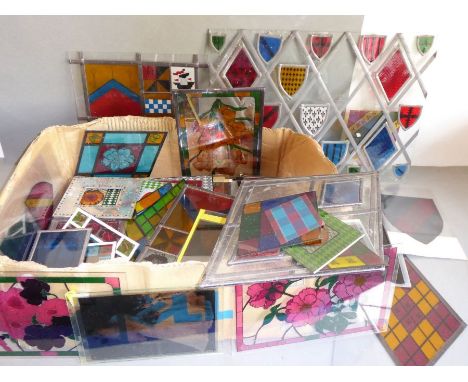 A selection of perspex and leaded light glass to include stained-glass-style ornamental shapes and windows&nbsp;