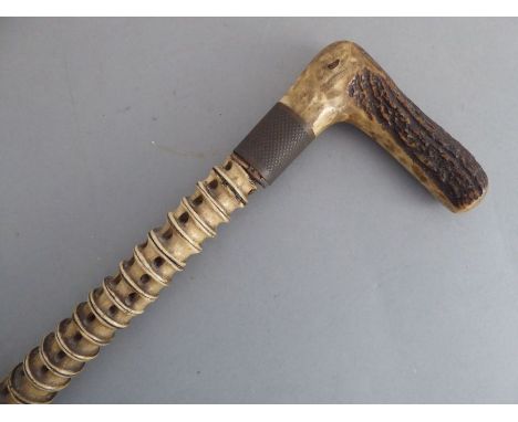 An interesting 19th century horn-handled walking stick made from shark's vertebrae with unengraved base metal ferule (86cm hi