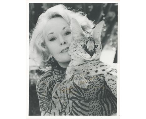 Tippi Hedren signed 10 x 8 inch b/w portrait photo. All autographs come with a Certificate of Authenticity. We combine postag
