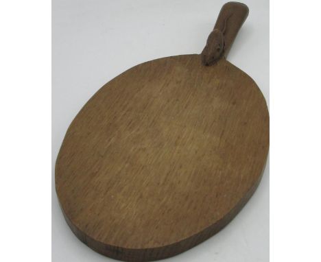 Robert Mouseman Thompson - oak oval cheeseboard, curved handle, carved with signature mouse, L28cm W18cm 