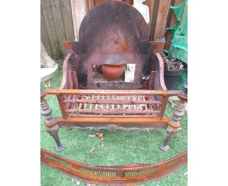 Geo. III style cast iron fire basket on turned supports with similar finials and arched back, W66cm D30cm H70cm and C19th ste
