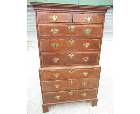 Geo. III mahogany cross banded oak chest on chest, with molded cornice above 2 short and 3 long drawers the base with 3 furth