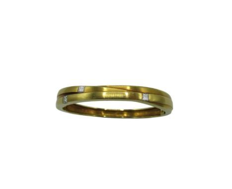 Boodles "Kit and Kaboodle" 18ct yellow gold bangle set with three princess cut diamonds on a hinged band with box clasp and s