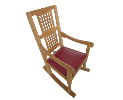 Robert Mouseman Thompson - oak rocking chair with interlaced double splat and brass nail ox blood leather upholstered seat on