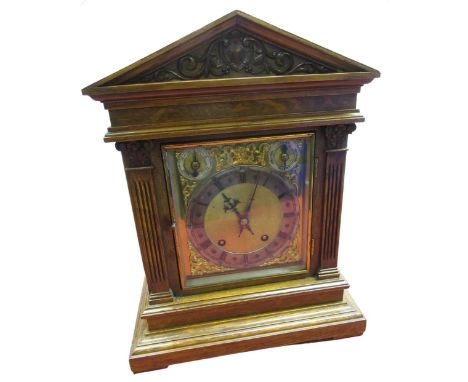 Late C19th oak cased architectural bracket clock, angular cornice and scroll columns, the square brass dial with silver Arabi