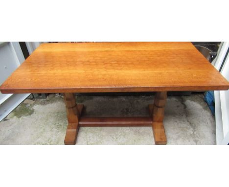 Robert Mouseman Thompson - oak dining table, adzed rectangular top on octagonal baluster supports, the sledge feet joined by 