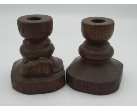 Robert Mouseman Thompson - pair of turned oak dwarf candlesticks, tapering octagonal bases carved with signature mouse, H10cm