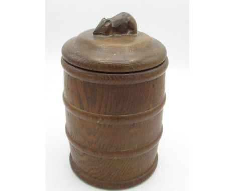 Robert Mouseman Thompson - turned oak biscuit barrel, cylindrical body with four raised bands, the stepped lid with carved mo