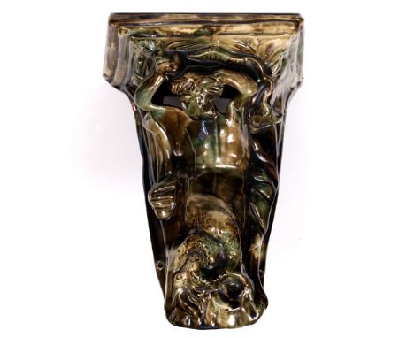 Dunmore Pottery  Wall shelf modelled as a mermaid impressed marks 27.5cm high.